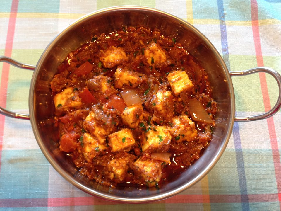 Delicious Kadai Paneer served in a traditional bowl